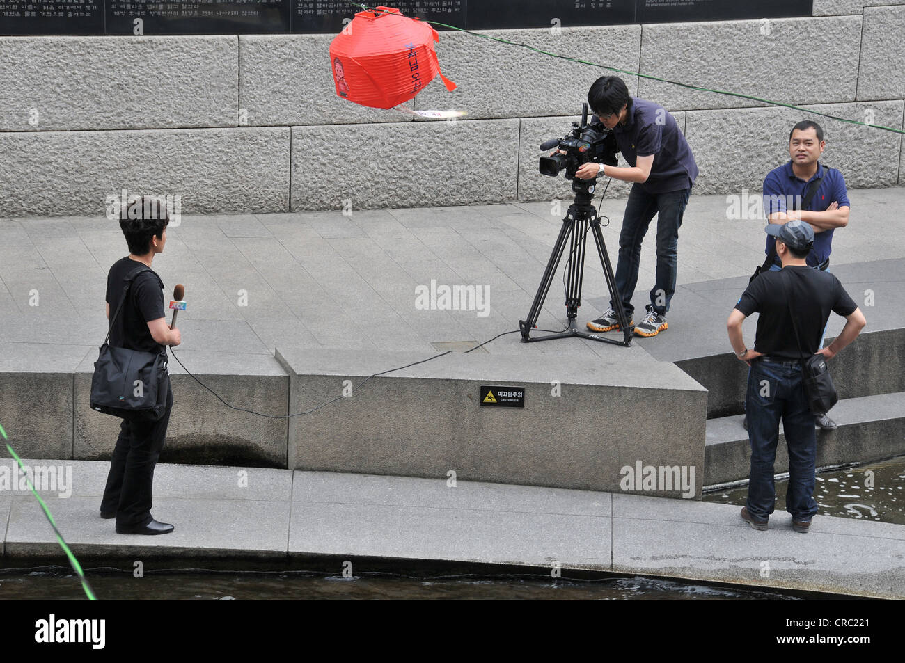 Cameraman and journalist working Seoul South Korea Asia Stock Photo