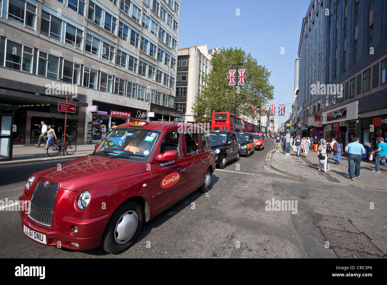 Daily city life: taxi stuck in traffic, Oxford Street, London, England, UK Stock Photo