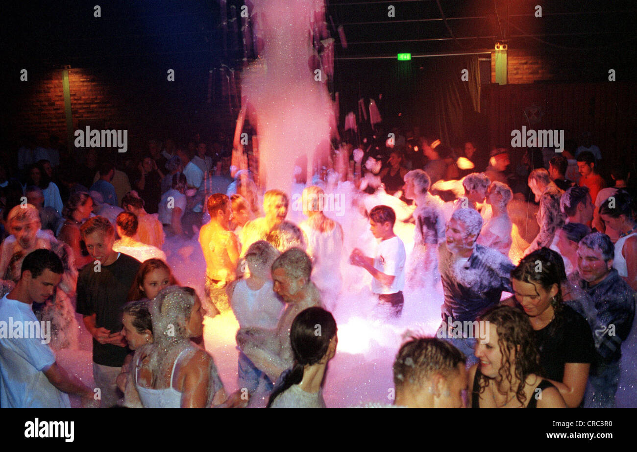 Dancing young people at a foam party in Bremen, Germany Stock Photo - Alamy