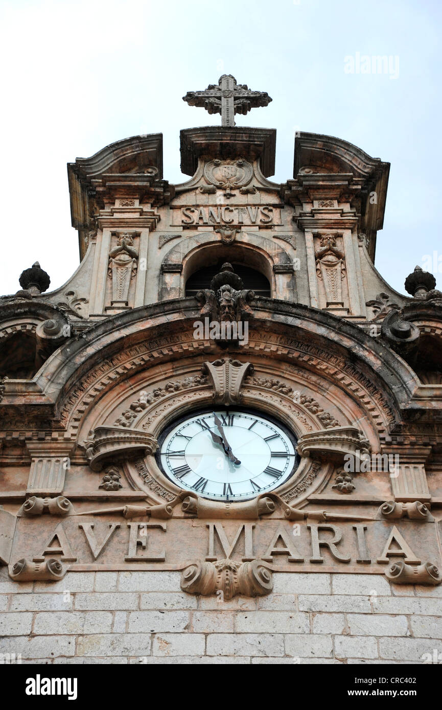Ave Maria lettering, clock in the courtyard, monastery Santuari de Lluc ...