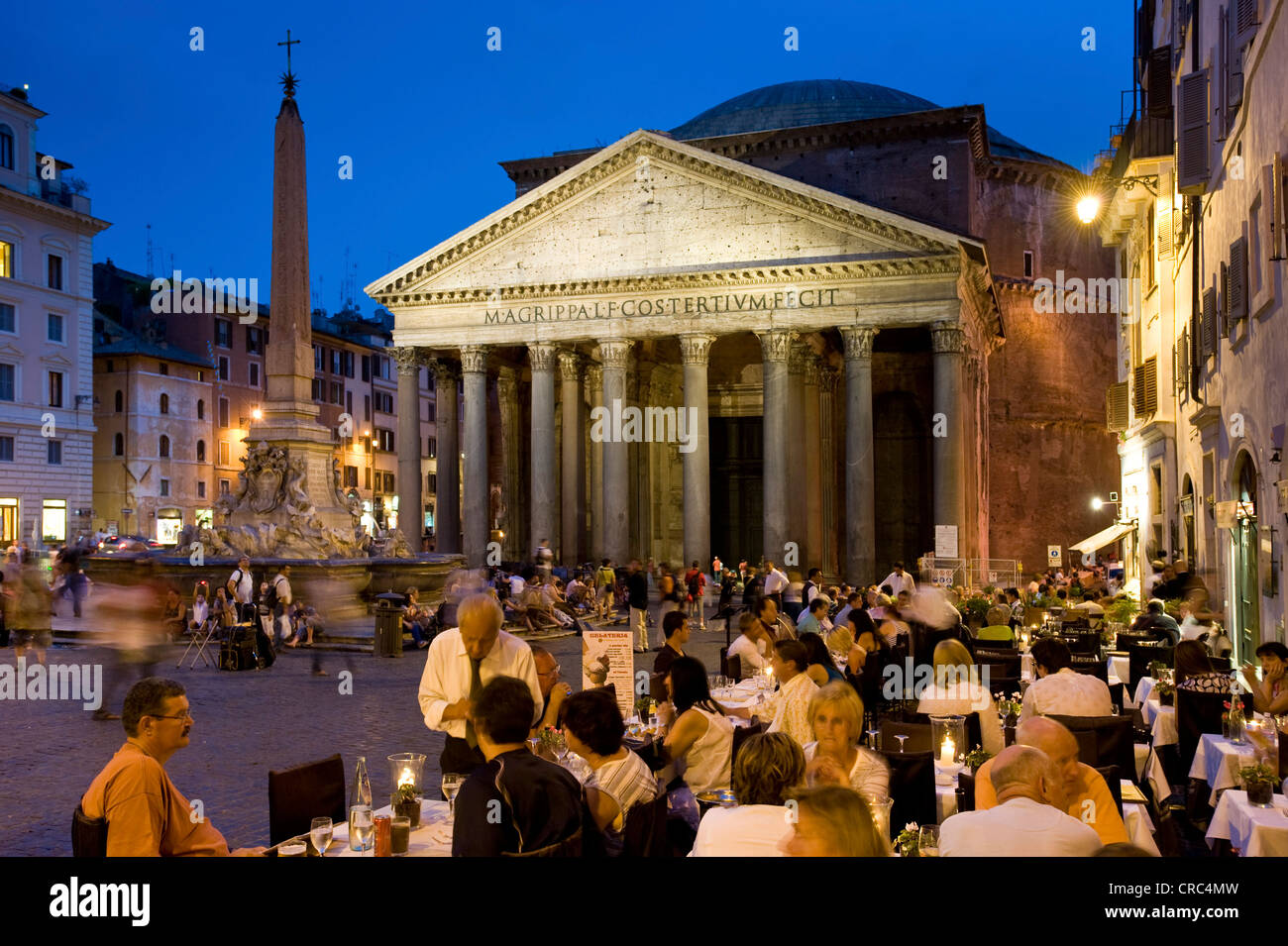 The Pantheon and the Piazza della Rotonda with restaurants at dusk, Rome, Italy, Europe Stock Photo