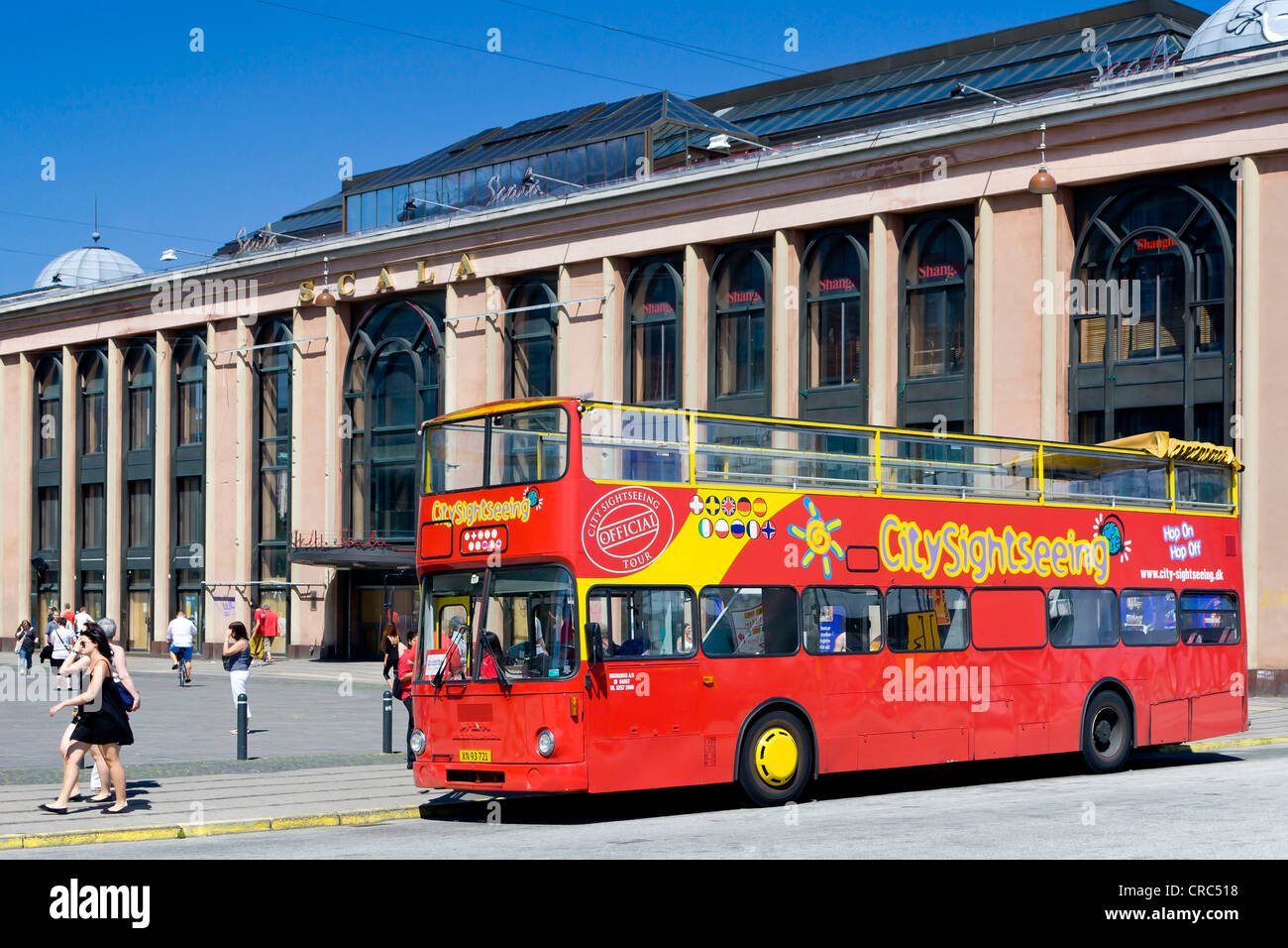 The Copenhagen sightseeing bus in front of the old Scala building, Copenhagen, Denmark, Europe Stock Photo