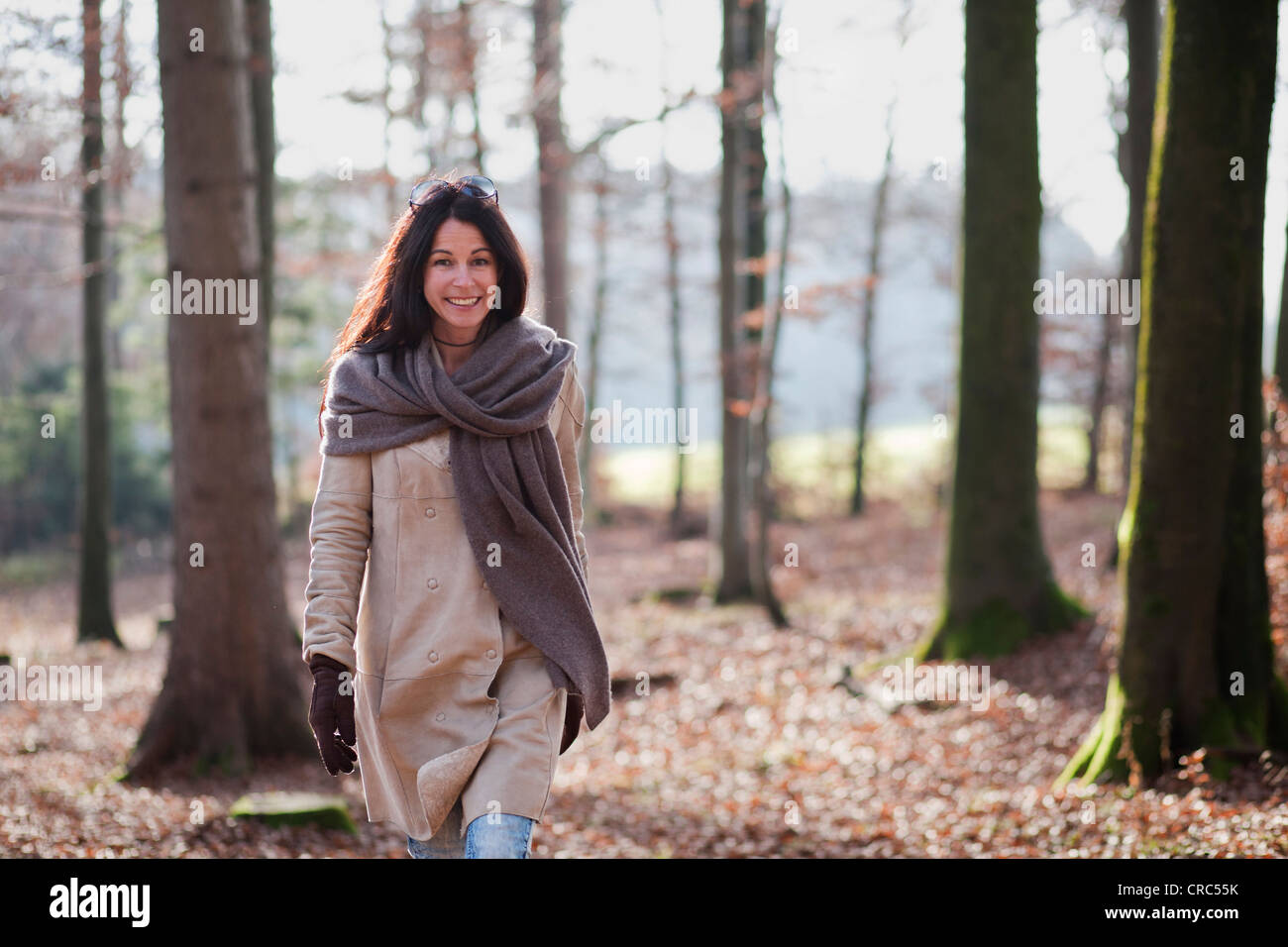Older woman walking outside in hi-res stock photography and images - Alamy