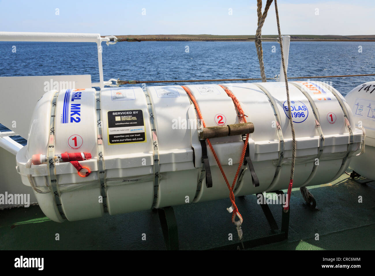 Inflatable survival liferaft with flare on the deck of the island ferry