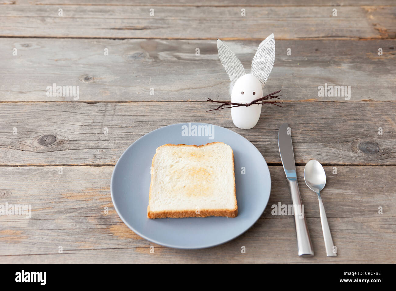 Rabbit decoration and plate of toast Stock Photo - Alamy
