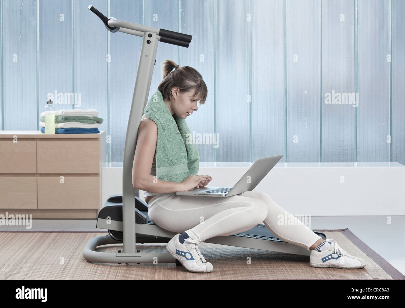 Woman reading exercise machine hi-res stock photography and images - Alamy