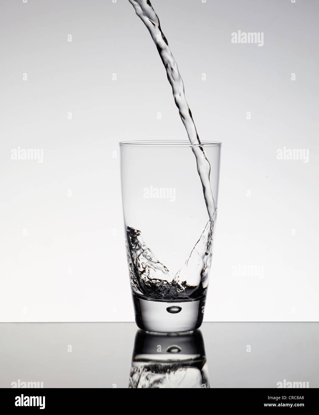 Water Pouring Into Glass Stock Photo Alamy