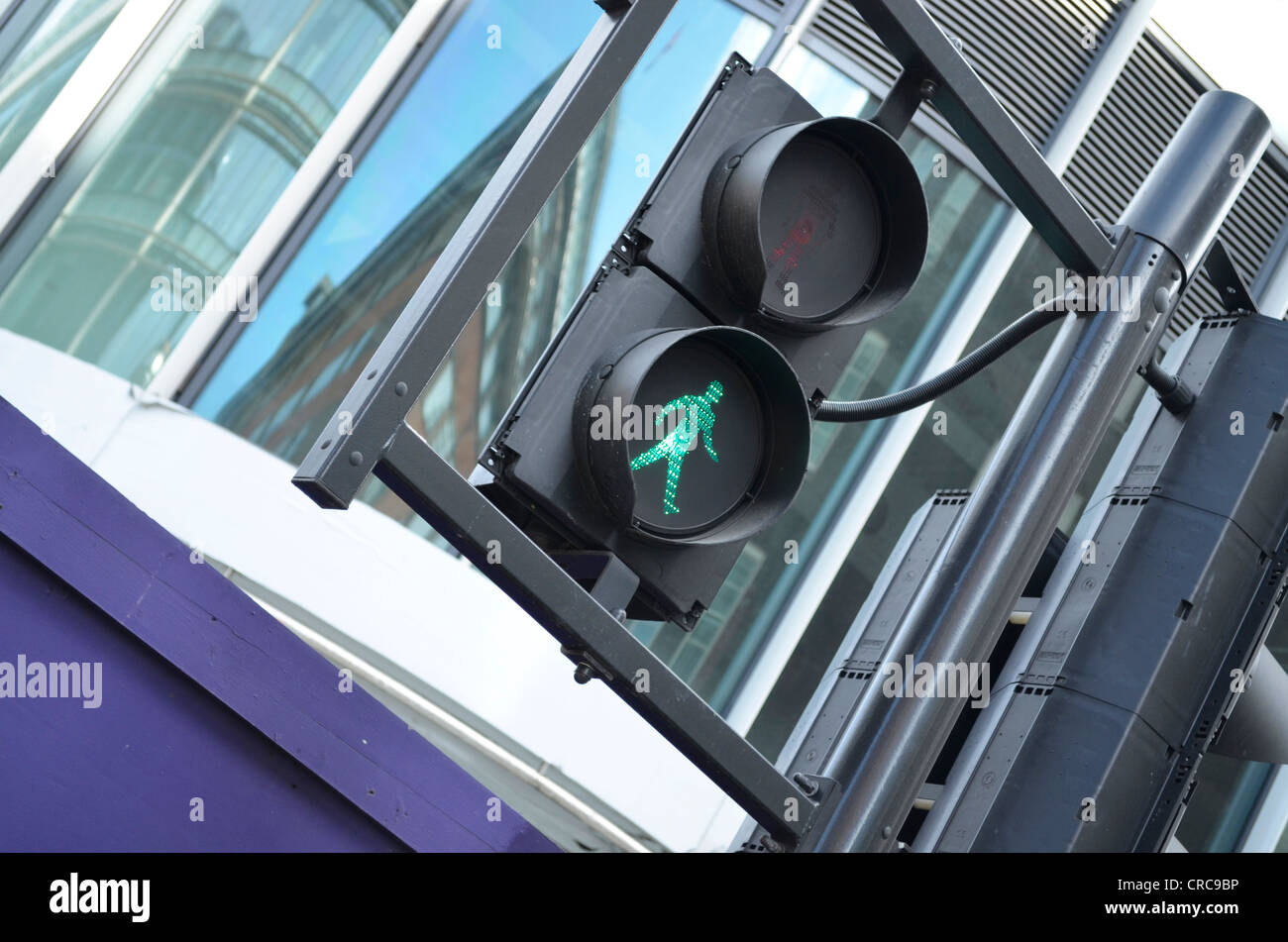 Picture of green man traffic light on a slant Stock Photo