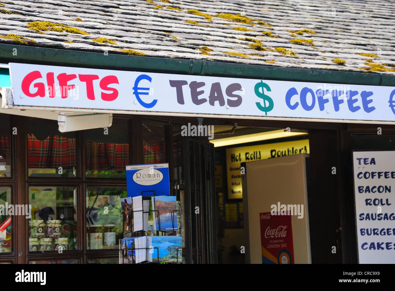 Gift and snack shop showing they accept Euros and Dollars Stock Photo