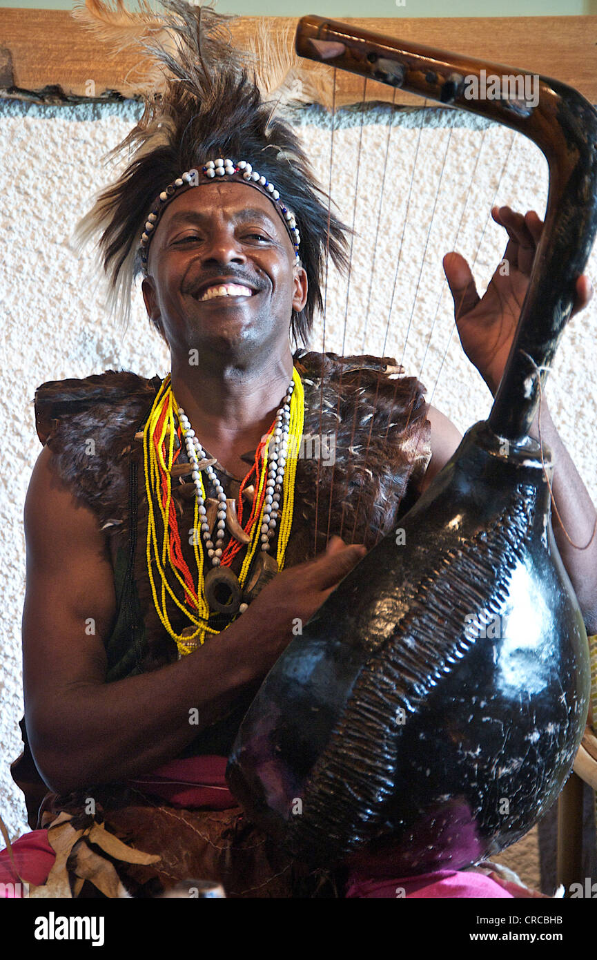 Portrait of a man playing traditional Kenyan instrument Stock Photo Alamy