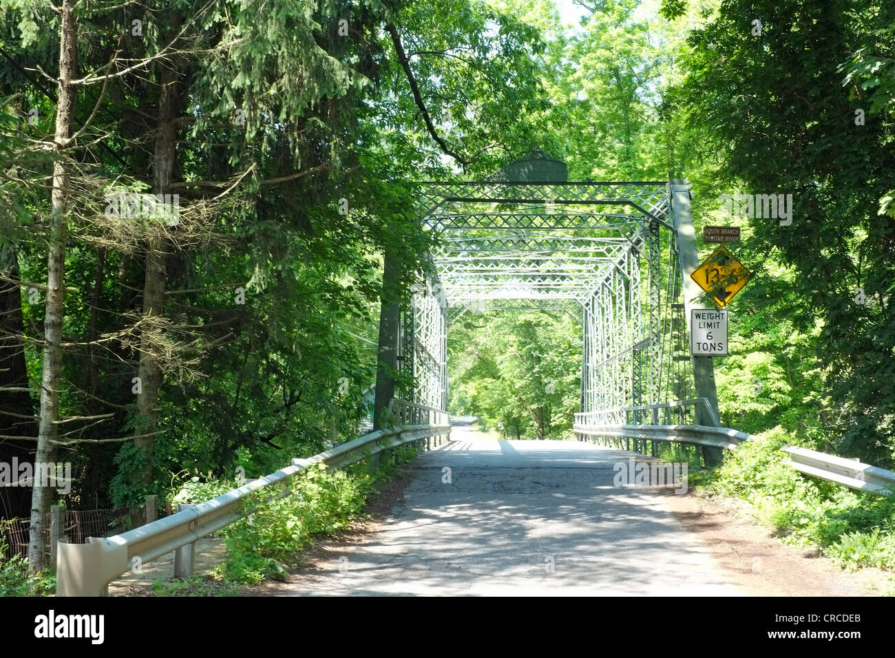 Green steel bridge on a country road Stock Photo Alamy