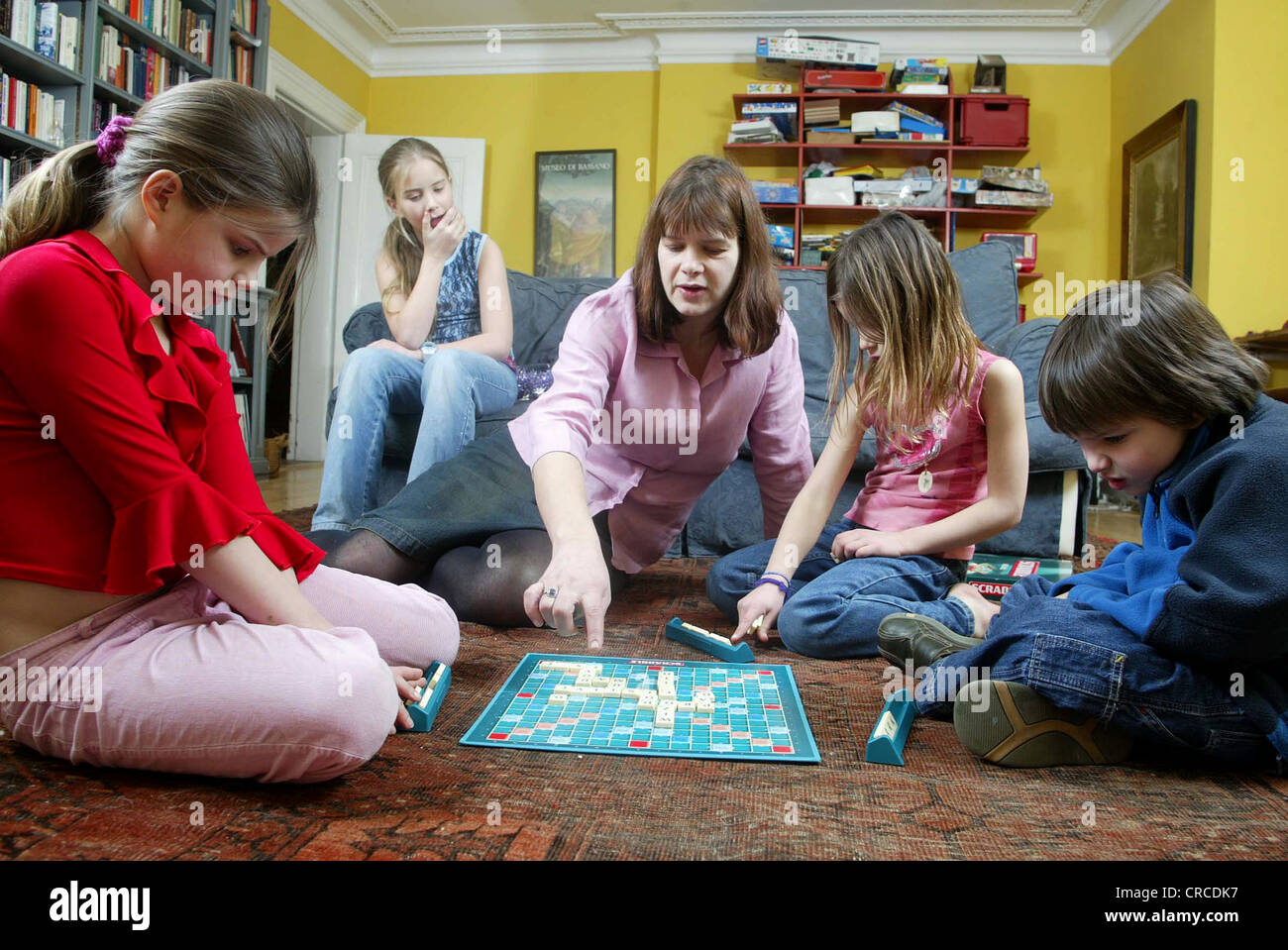 Family at home playing Scrabble board game, United Kingdom Stock Photo 48831979 Alamy