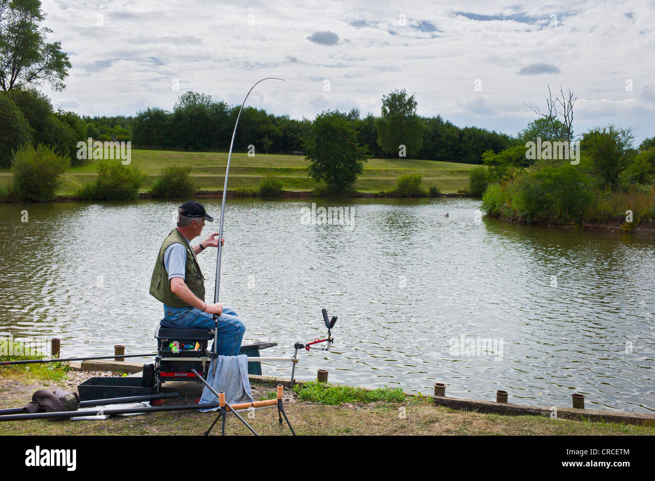 Pole fishing for carp at a lake in Leicestershire Stock Photo Alamy