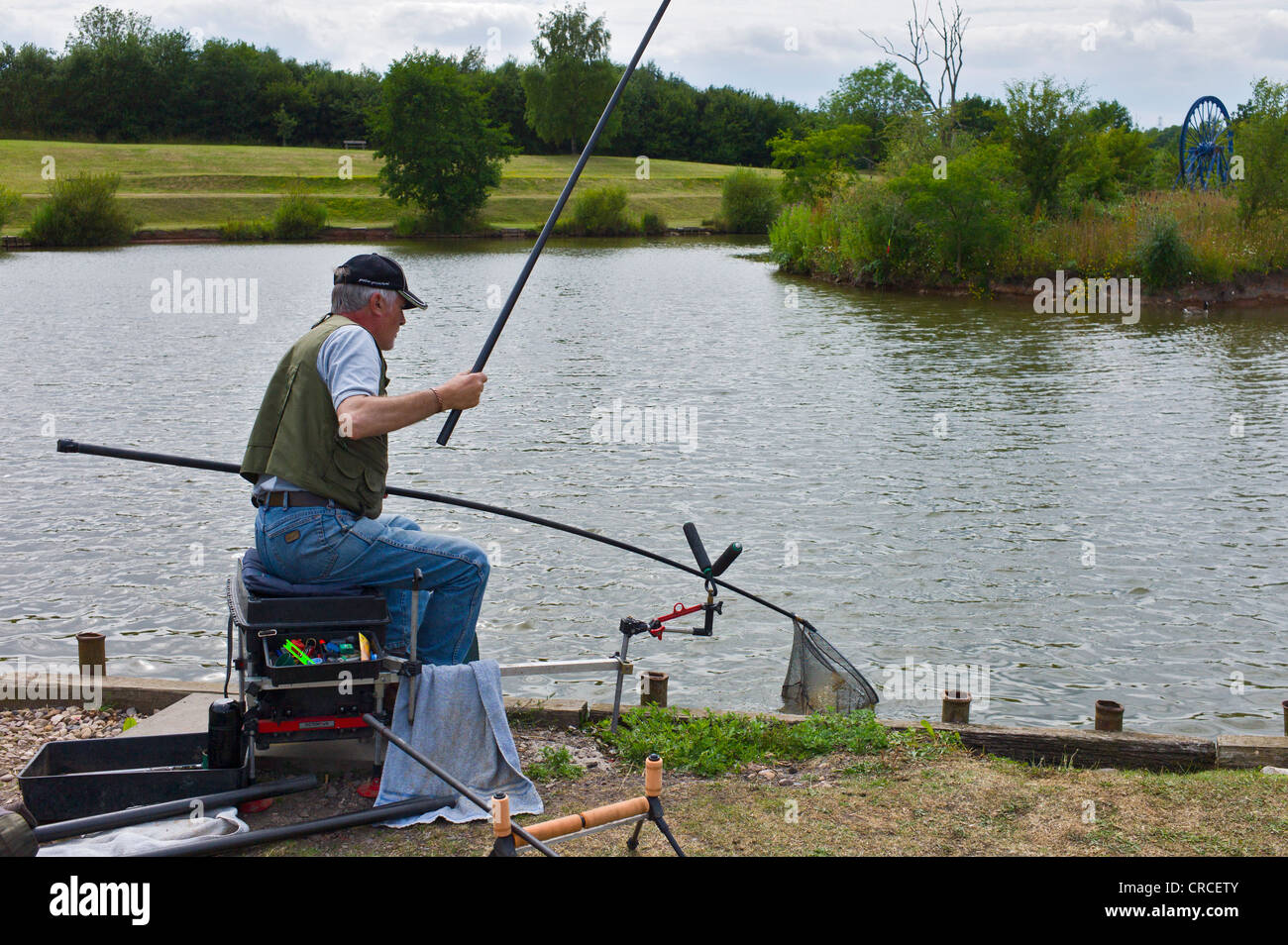 Pole fishing for carp at a lake in Leicestershire Stock Photo - Alamy
