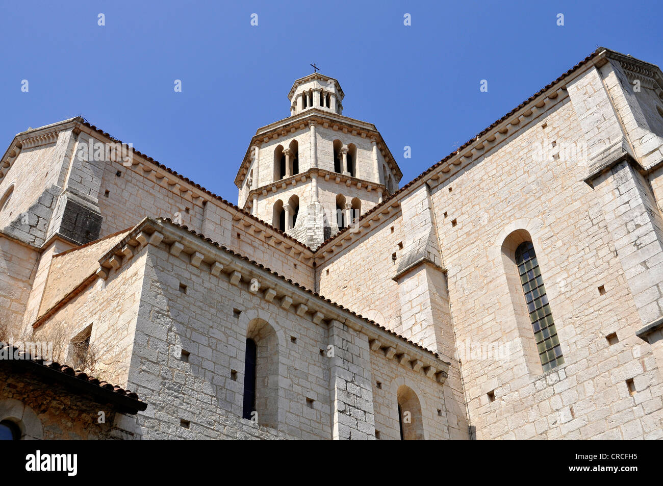 Transept, bell tower and apse of the Gothic basilica of the Cistercian monastery Fossanova Abbey, near Priverno, Lazio, Italy Stock Photo