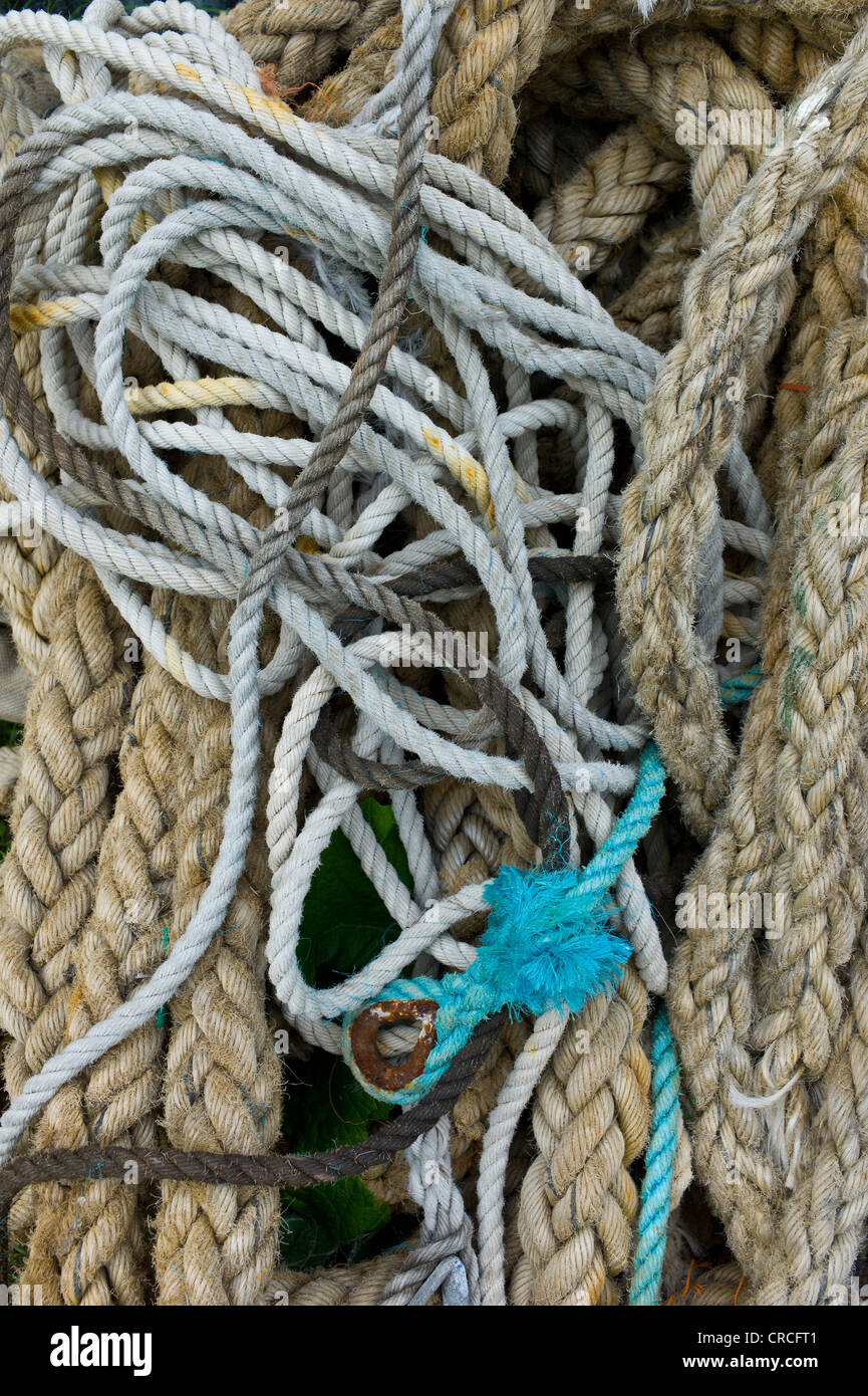 Old ropes on a cart in a boatyard Stock Photo