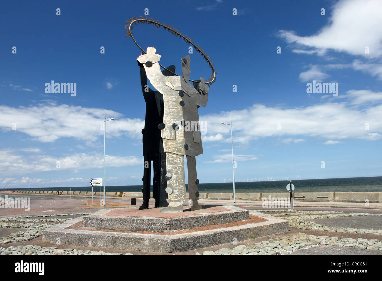 Metal clown statue people to New Brighton on the Wirral Stock
