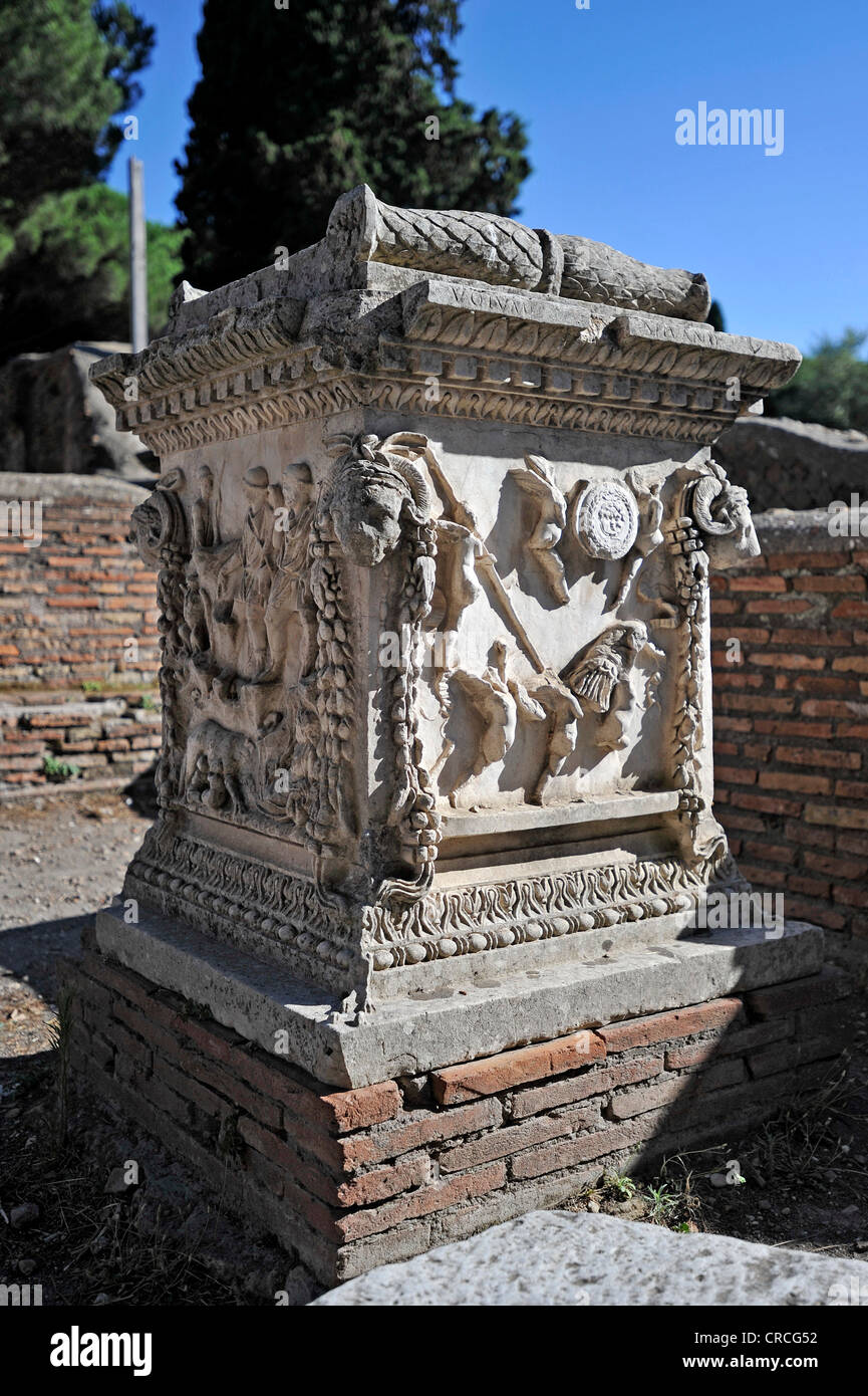Relief on the sacred altar of Romulus and Remus, Sacello dell 'Ara Tues Romolo e Remo, Ostia Antica archaeological site Stock Photo