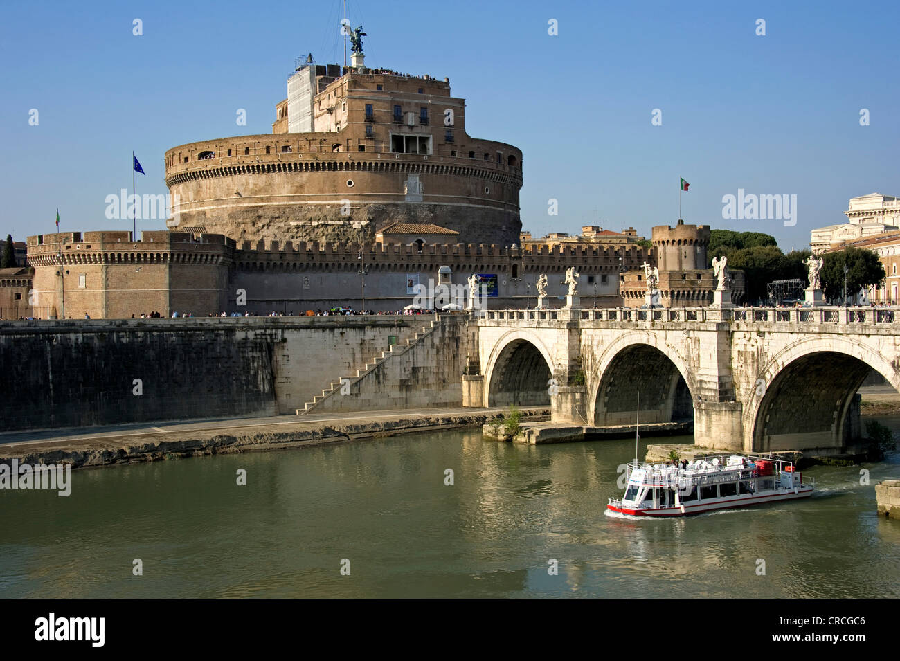 Castel Sant'Angelo or Mausoleum of Hadrian and bridge Ponte Sant'Angelo, Tiber river with ship, Rome, Lazio, Italy, Europe Stock Photo