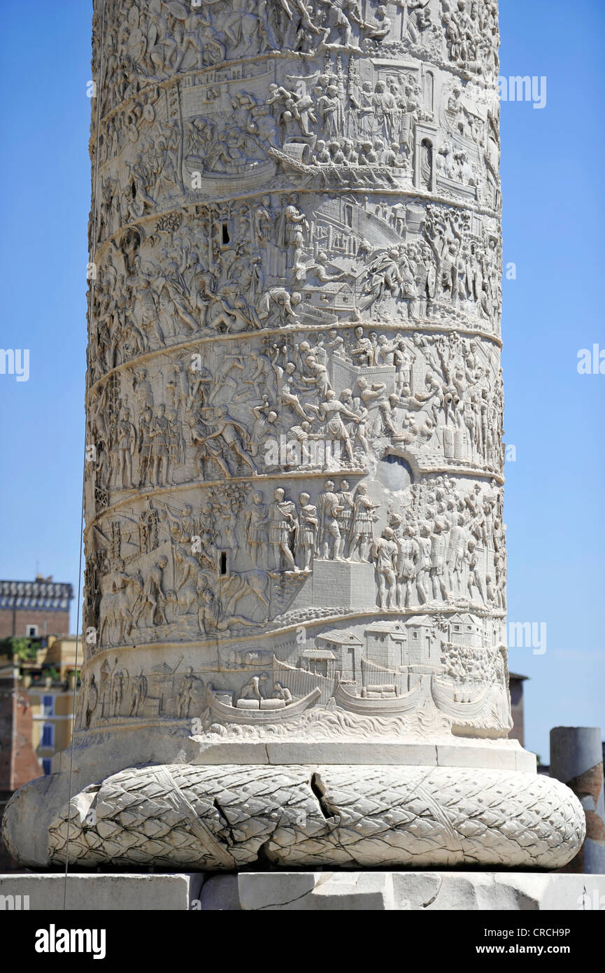 Foot of Trajan's Column with depictions of war in a relief band, Trajan's Forum, Via dei Fori Imperiali, Rome, Lazio, Italy Stock Photo