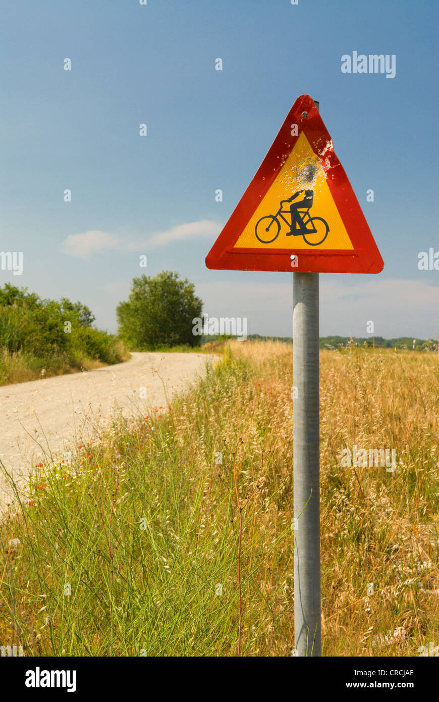 attention bikers. Traffic sign destroyed by vandals, Greece, Thessalien, Stomio Stock Photo