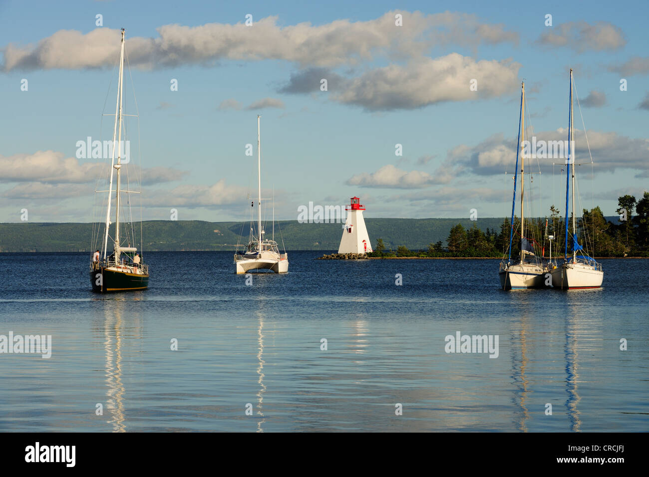 Bras d'Or Lake with lighthouse in the port of Baddeck, Nova Scotia, Canada, North America Stock Photo