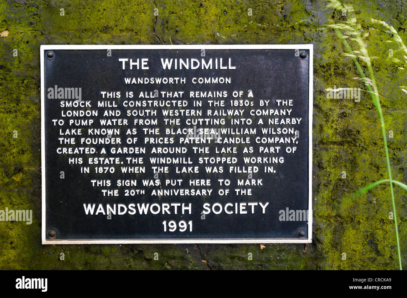 Sign on the side of the drainage windmill or windpump on Wandsworth Common, London. Stock Photo