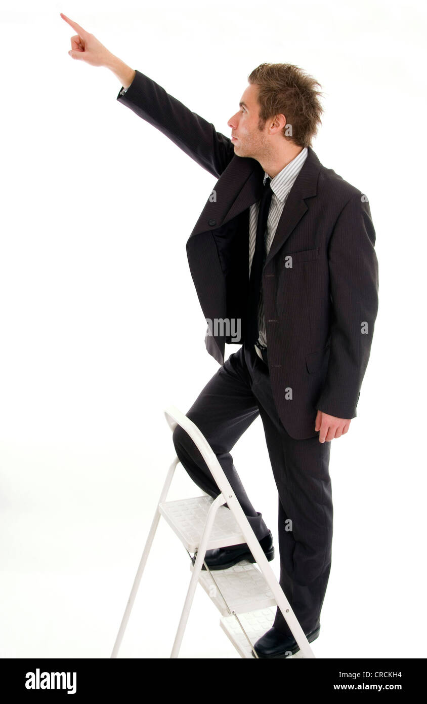 young businessman on job ladder Stock Photo