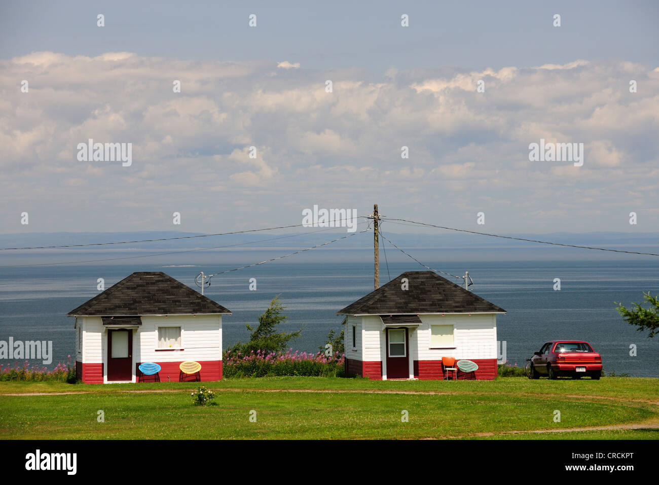 Holiday homes on the St. Lawrence River, Gaspe Peninsula, Gaspésie, Quebec, Canada Stock Photo