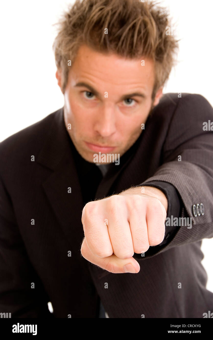 young man with clenched fist Stock Photo Alamy