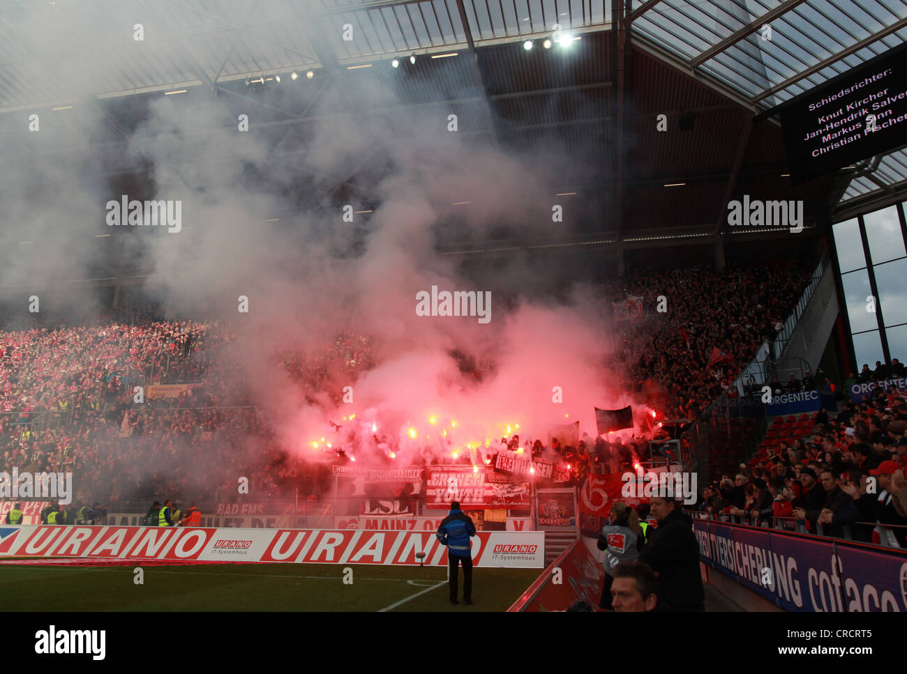 Fans of 1. FC Kaiserslautern have ignited fireworks, football Bundesliga, FSV Mainz 05 vs 1. FC Kaiserslautern, Coface-Arena Stock Photo