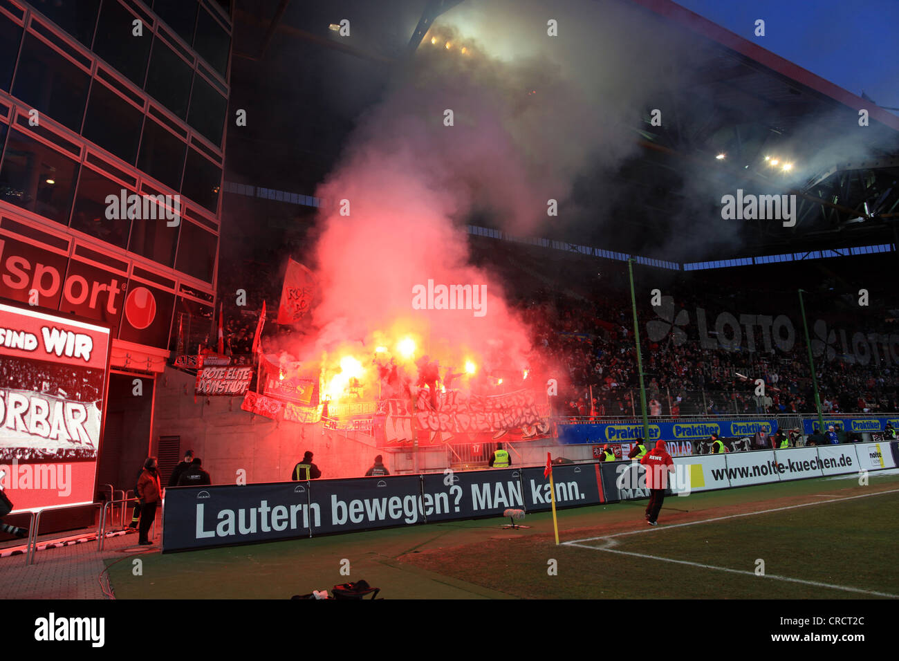 Cologne fans have ignited fireworks, Bundesliga football league, 1. FC Kaiserslautern - 1. FC Cologne, Fritz-Walter-Stadium Stock Photo