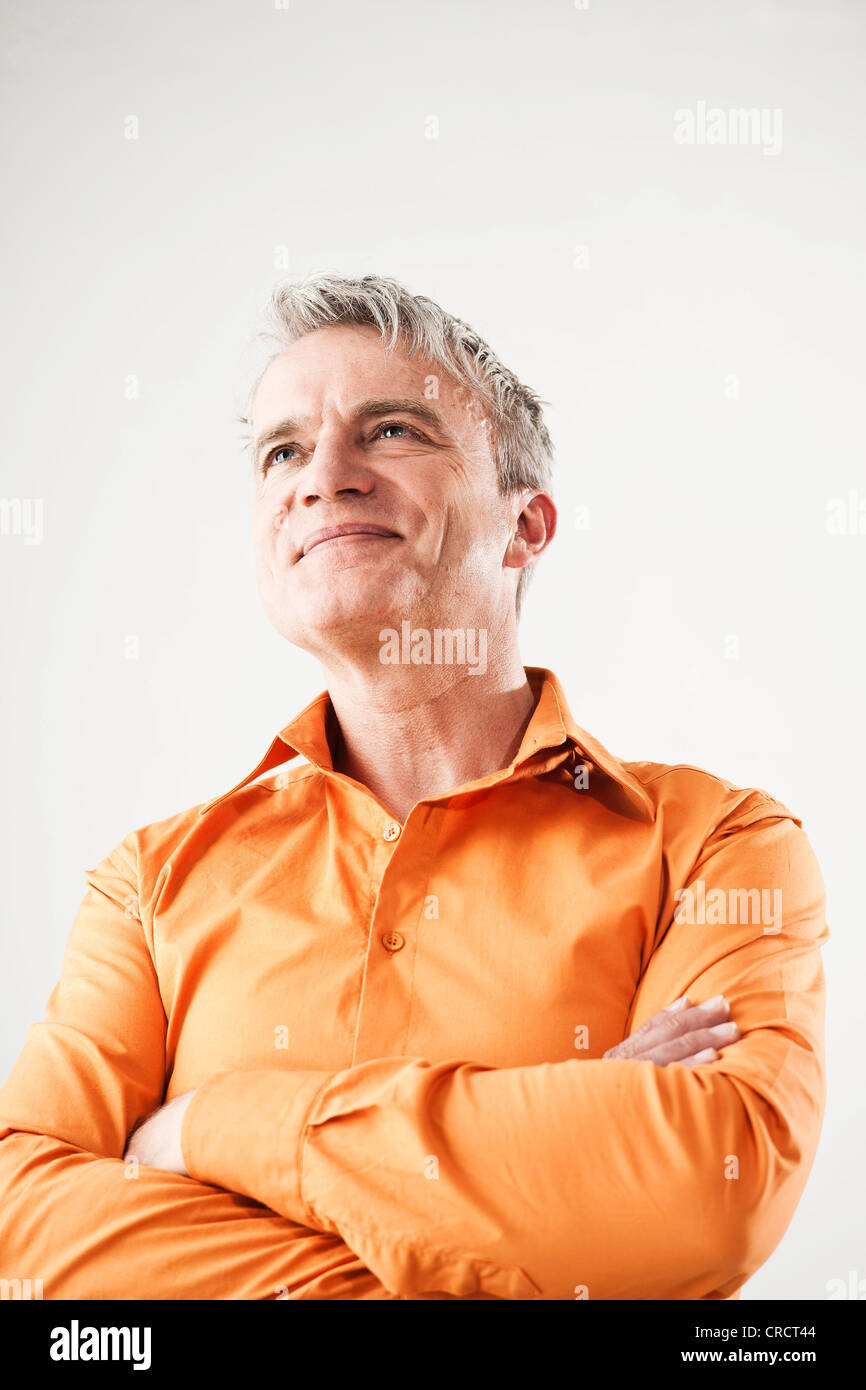 Mature man wearing orange hi-res stock photography and images - Alamy