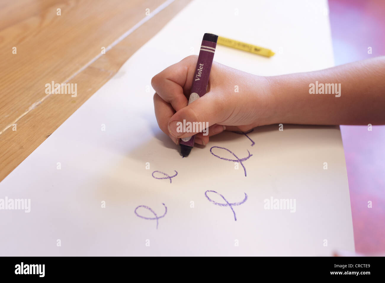 Student of the second grade of elementary school learning how to write, cursive handwriting, Niederwerth, Rhineland-Palatinate Stock Photo