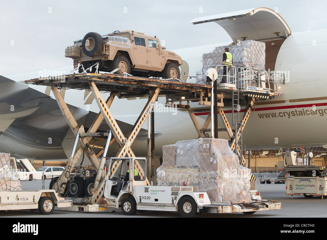 Loading of a military vehicle onto a Boing 777 cargo plane at Frankfurt-Hahn airport, Lautzenhausen, Rhineland-Palatinate Stock Photo