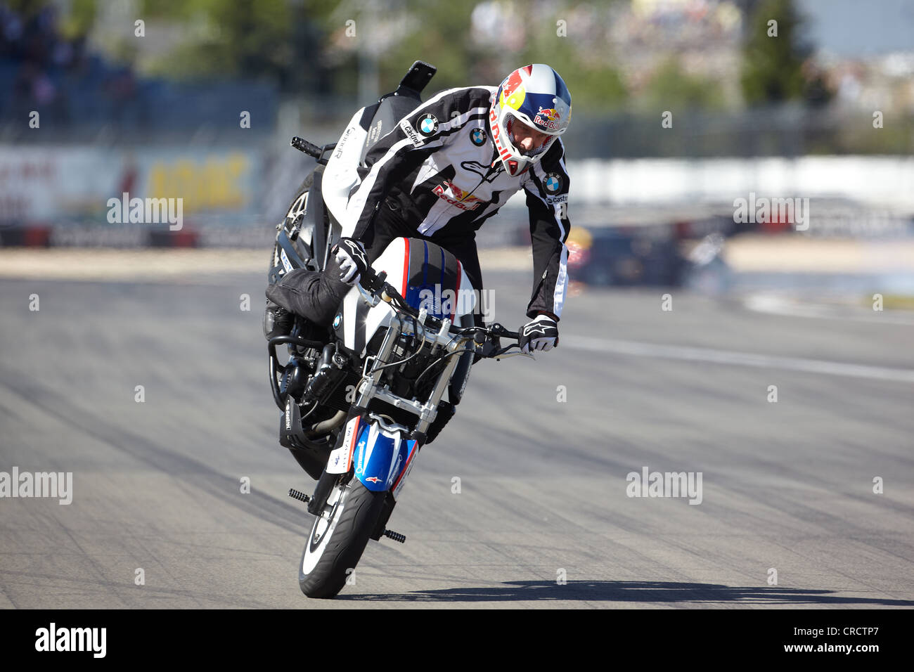 Motorcyclist performing 'stoppy' at a motorcycle stunt show, Nuerburgring race track, Rhineland-Palatinate, Germany, Europe Stock Photo