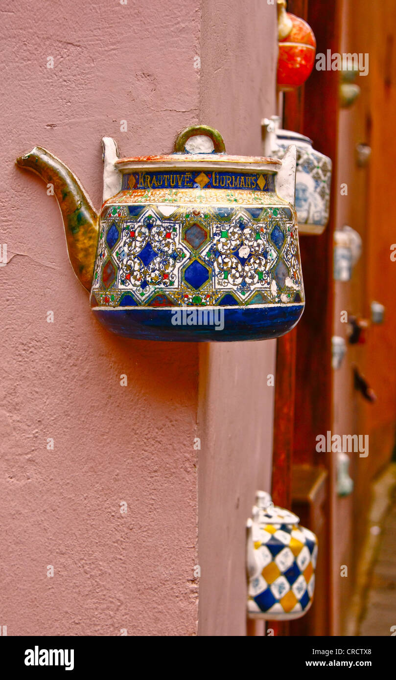 Unconventional view of the old ceramic kettle masoned into the wall Vilnius Latvia Stock Photo