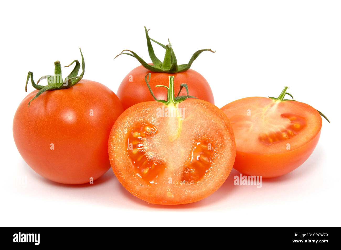 red fresh tomatos over a white background Stock Photo - Alamy