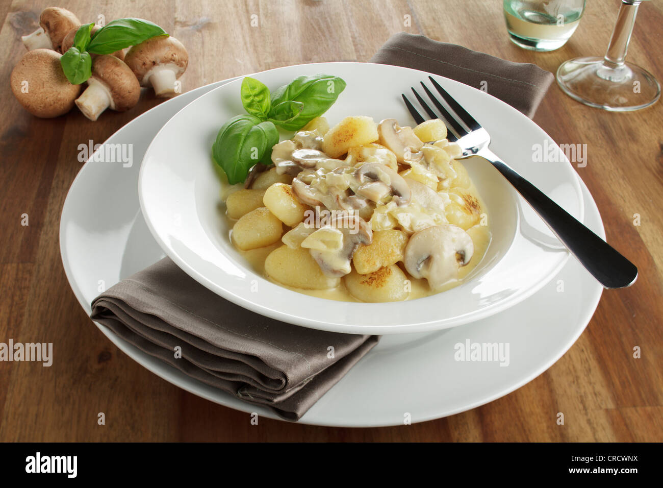 Potato gnocchi with mushrooms in cream sauce Stock Photo Alamy