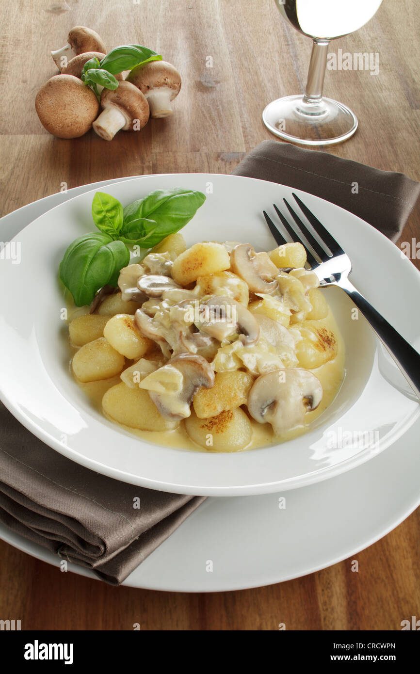Potato gnocchi with mushrooms in cream sauce Stock Photo Alamy