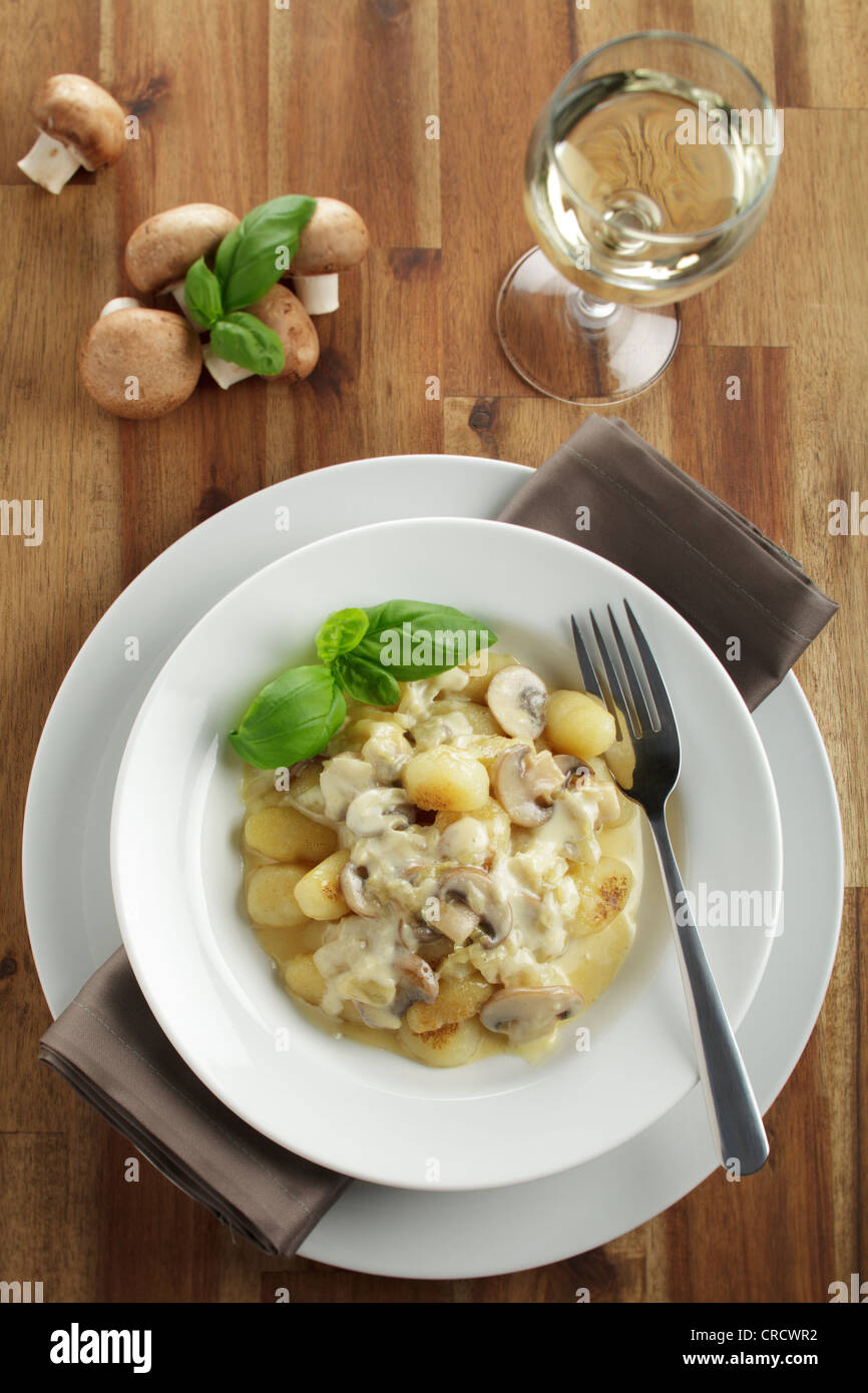 Potato gnocchi with mushrooms in cream sauce Stock Photo Alamy