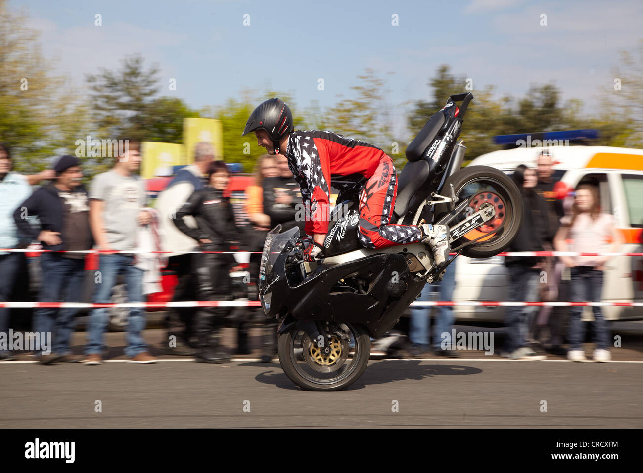 Motorcycle stuntman Mike Auffenberg showing a stoppy, Koblenz, Rhineland-Palatinate, Germany, Europe Stock Photo
