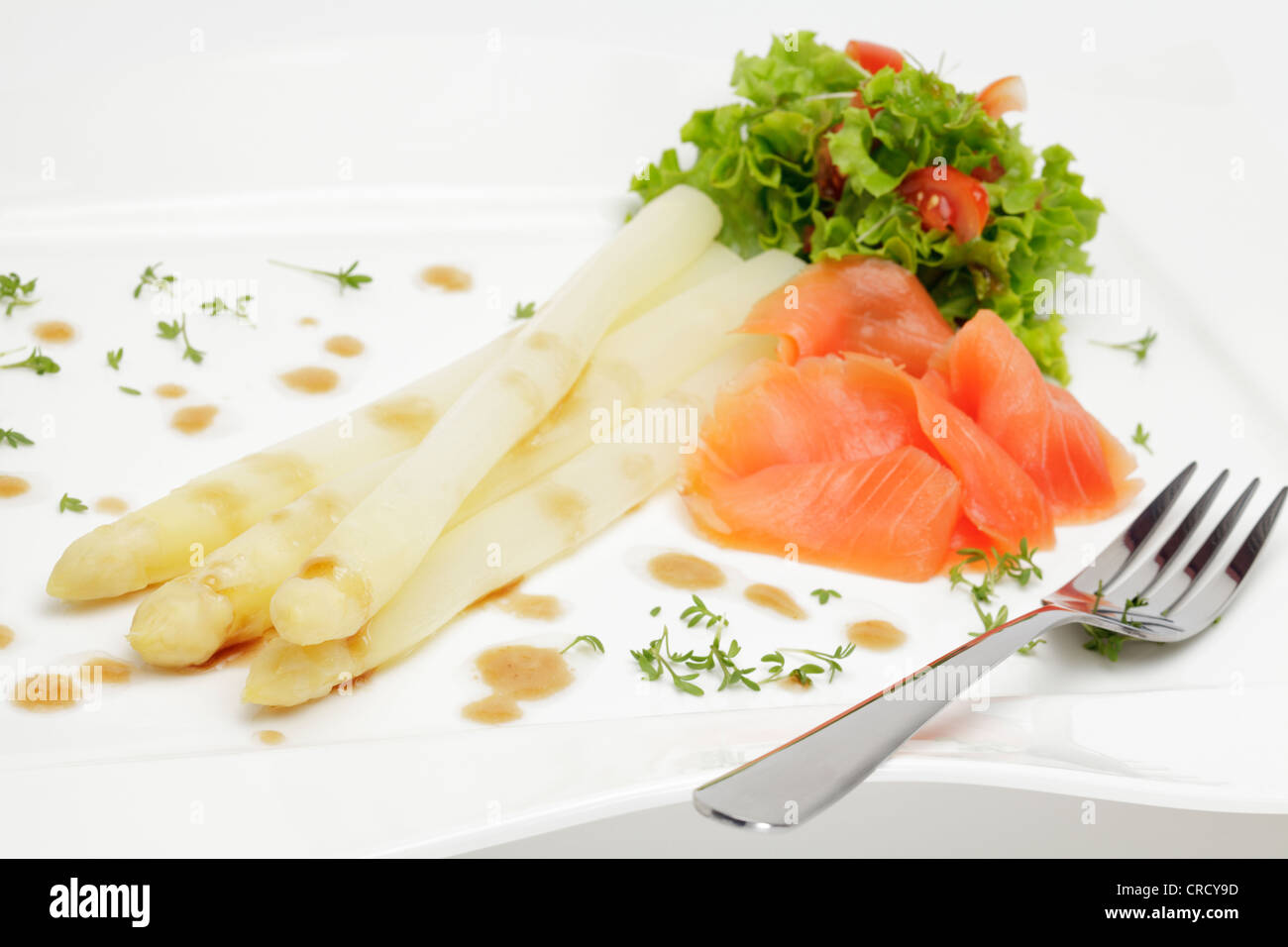 White asparagus with smoked salmon, green salad and balsamic vinaigrette Stock Photo Alamy