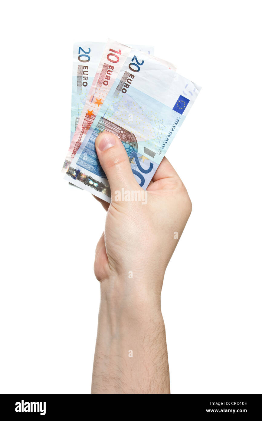 Male hand holding euro money banknotes. Isolated on white background ...