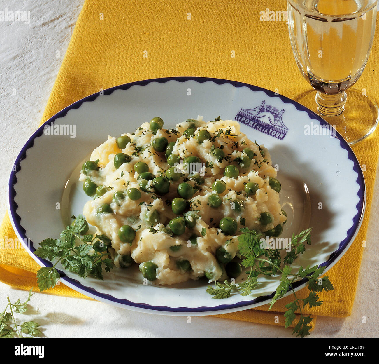 Mashed potatoes with peas, France. Stock Photo