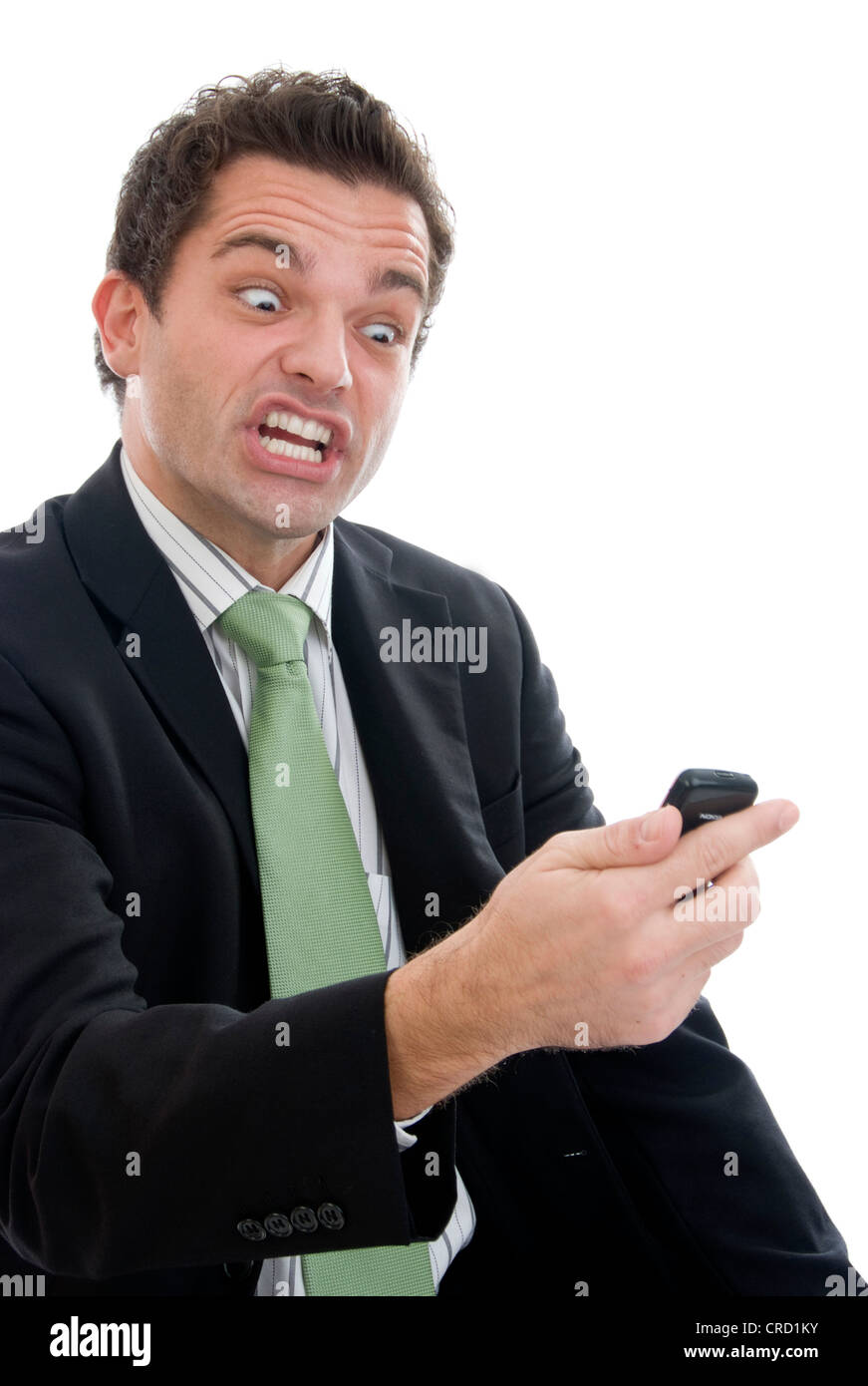 angry businessman with mobile phone Stock Photo