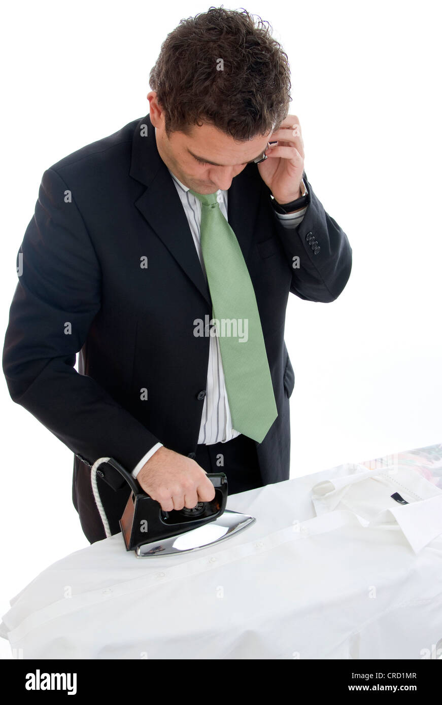 businessman does ironing Stock Photo