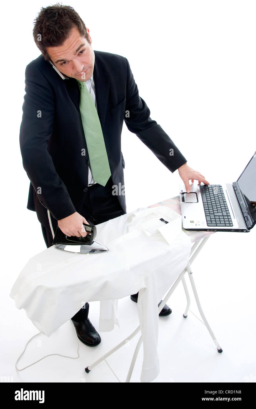 businessman does ironing Stock Photo