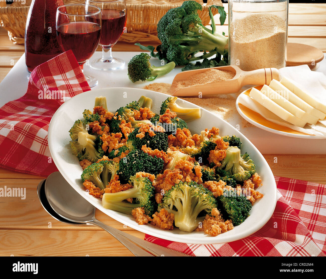 Broccoli with butter crumbles and vegetables hires stock photography