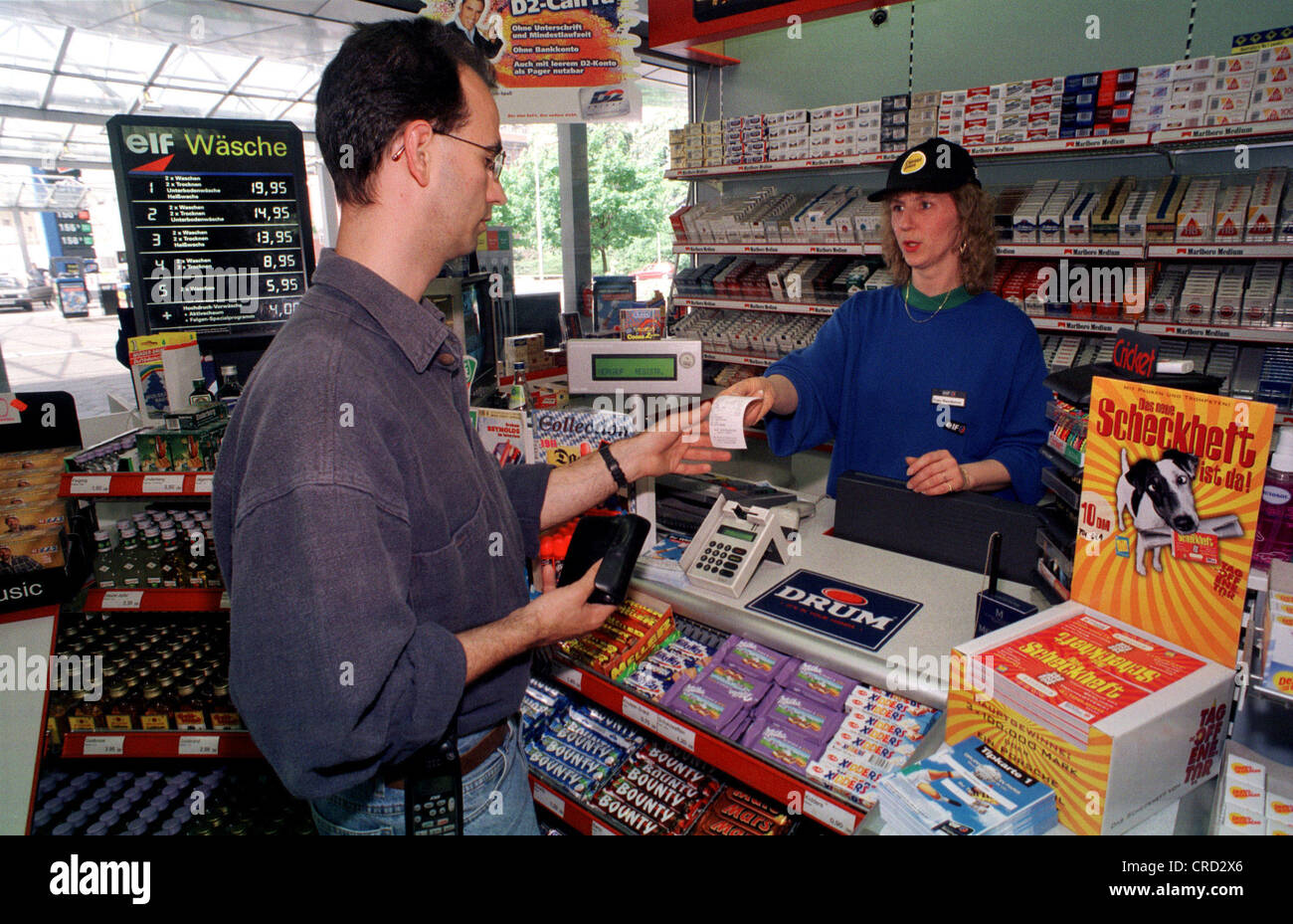 Elf Oil gas station, buying, selling situation Stock Photo Alamy